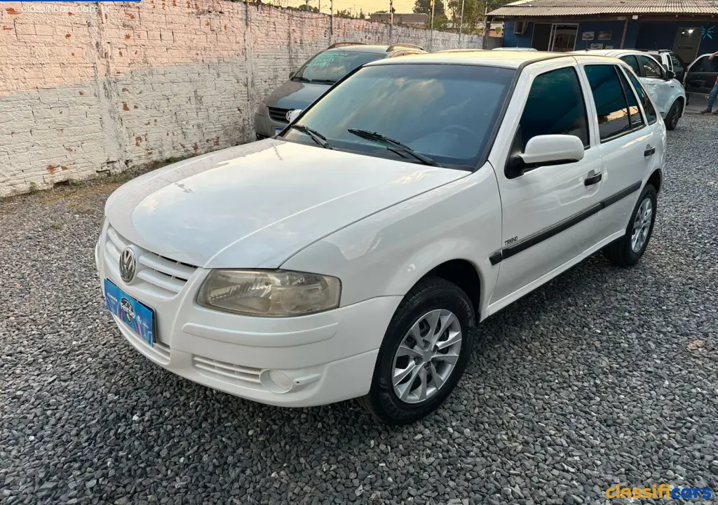 VW+-+VolksWagen-MT-V%C3%A1rzea+Grande-Gol+ECOMOTION++1.0+Mi+Total+Flex+8V+4p-2012+Flex-Branca