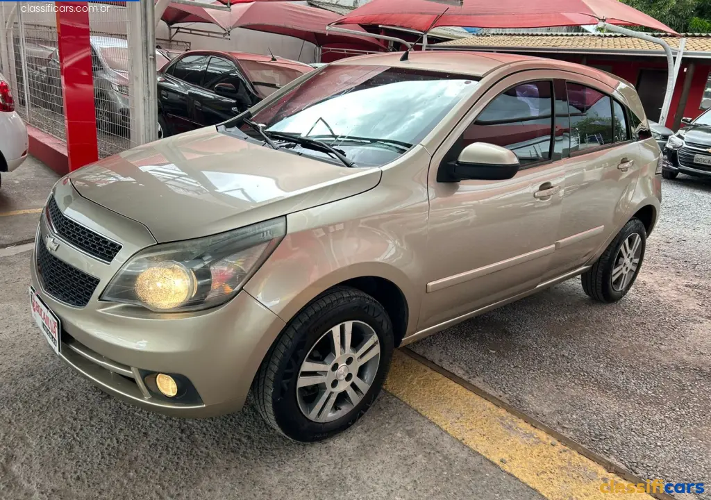 GM+-+Chevrolet-MT-V%C3%A1rzea+Grande-AGILE+LTZ+1.4+MPFI+8V+FlexPower+5p-2013+Flex-DOURADO