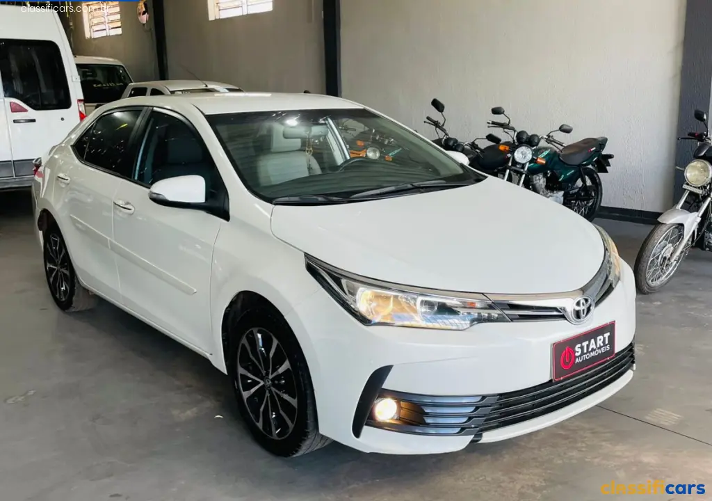 Toyota-MT-V%C3%A1rzea+Grande-Corolla+XEi+2.0+Flex+16V+Aut.-2018+Gasolina-Branca